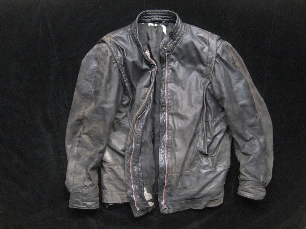 voorkant versleten jasje